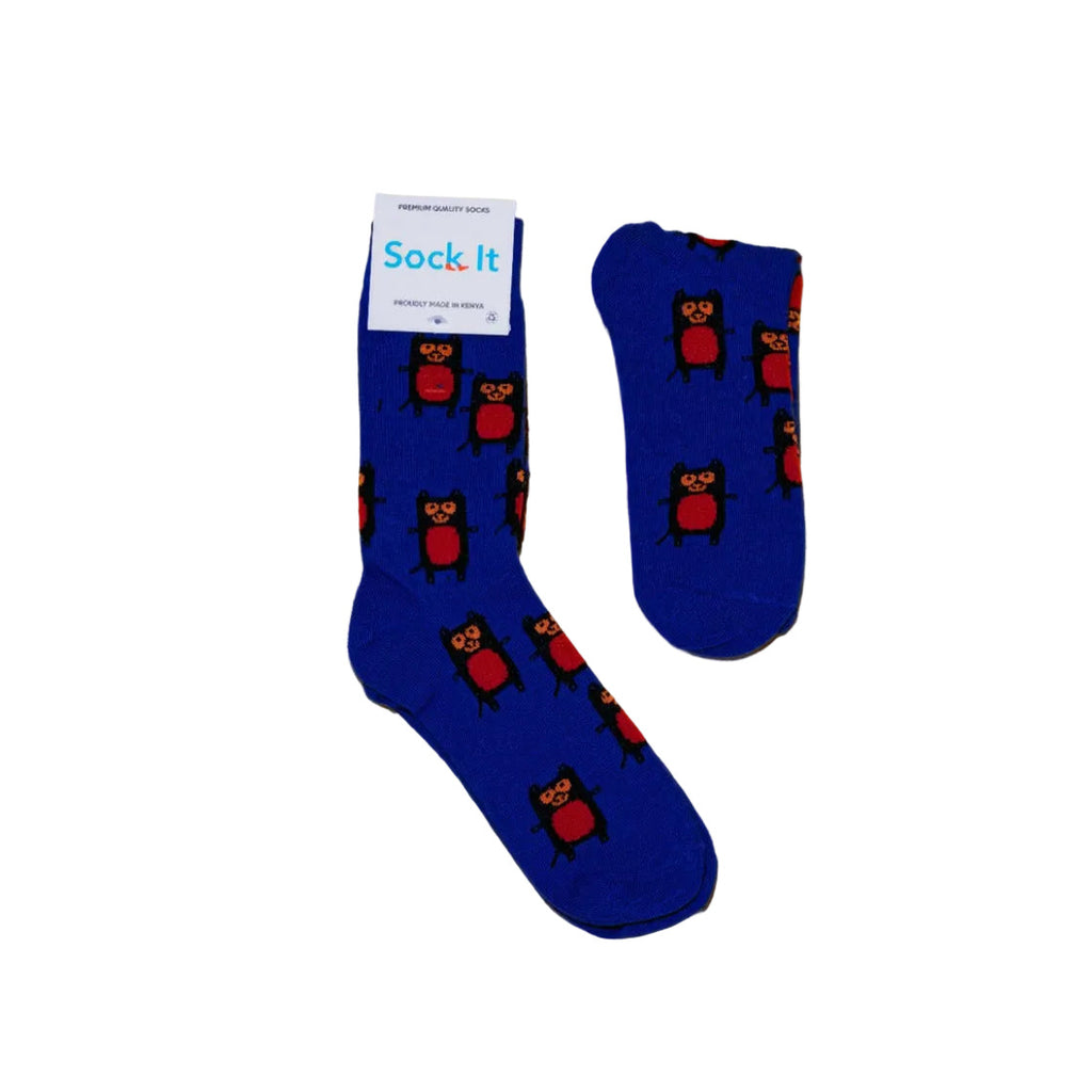 Blue socks with owl pattern on a white background, featuring 'Sock It' branding.
